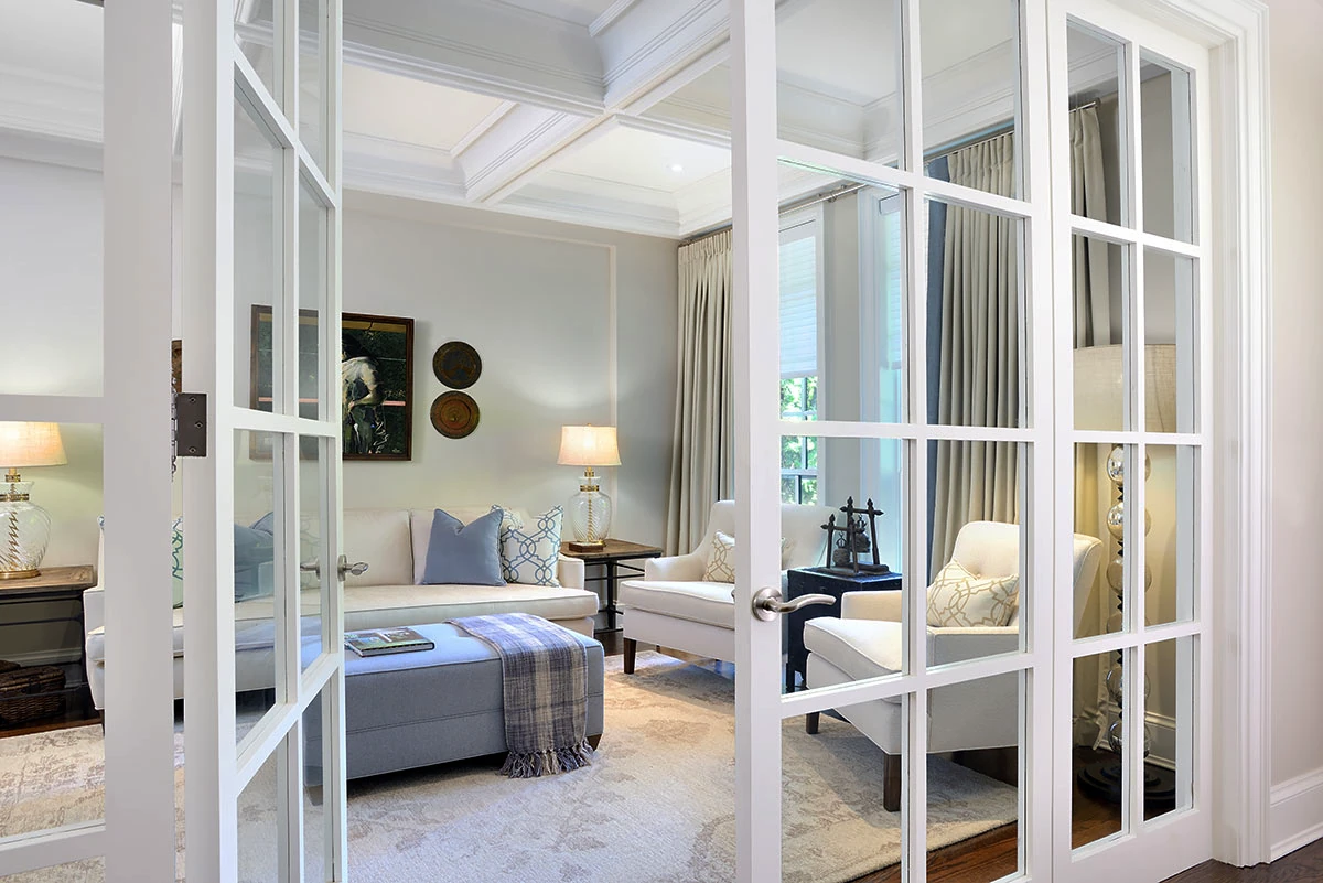 Elegant interior with French doors and coffered ceiling showcasing Maco Painting's craftsmanship